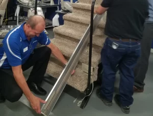 tech working on Chair Lift Repair and Stairlift Installation in Rochester, MN 